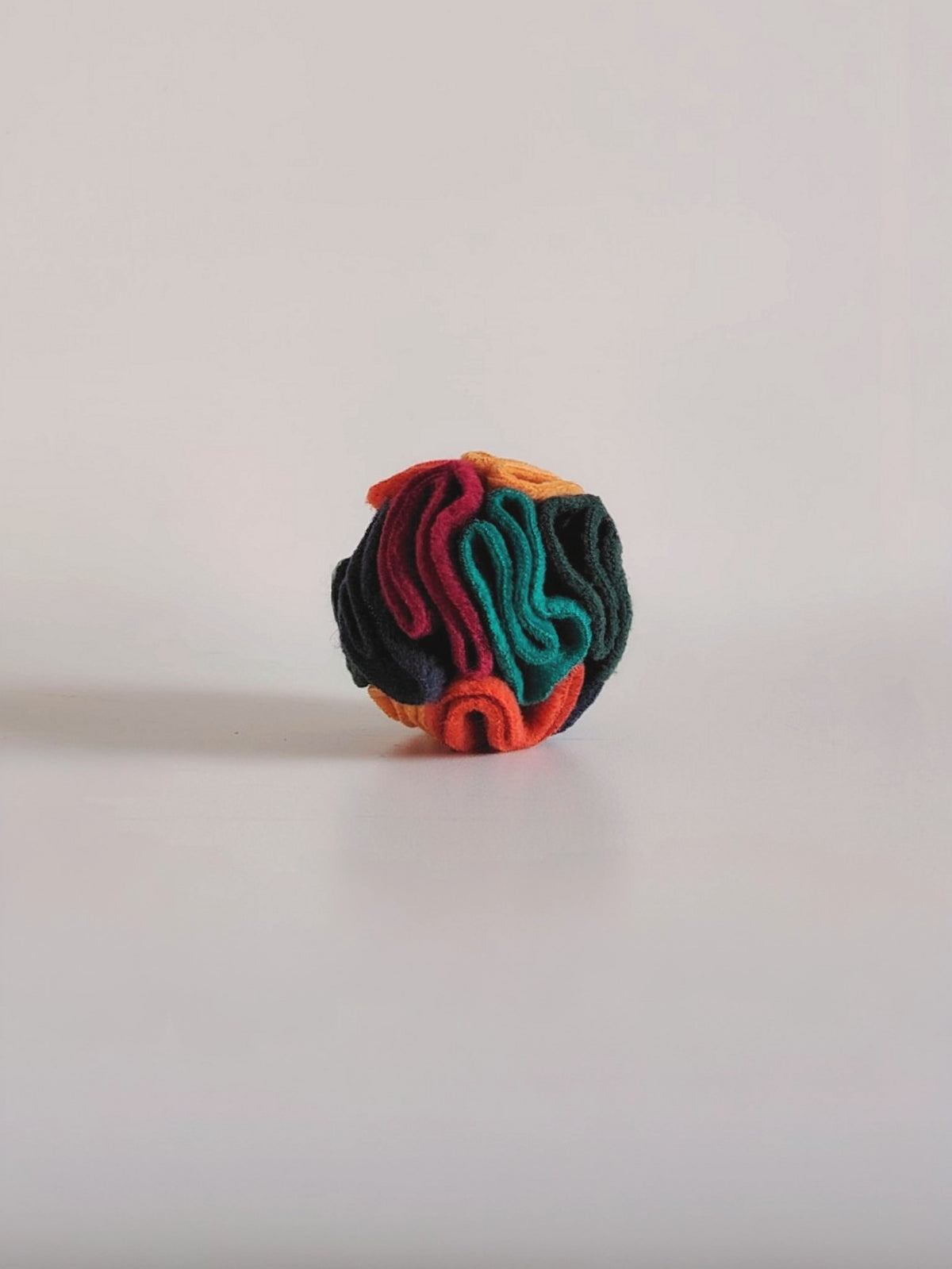 Warm pocket snuffle ball close up showing fleece layers and texture.