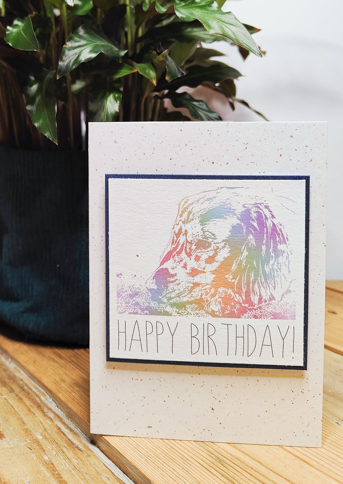 Blue Cocker Spaniel birthday card with colourful digitally illustrated spaniel design and Happy Birthday text.