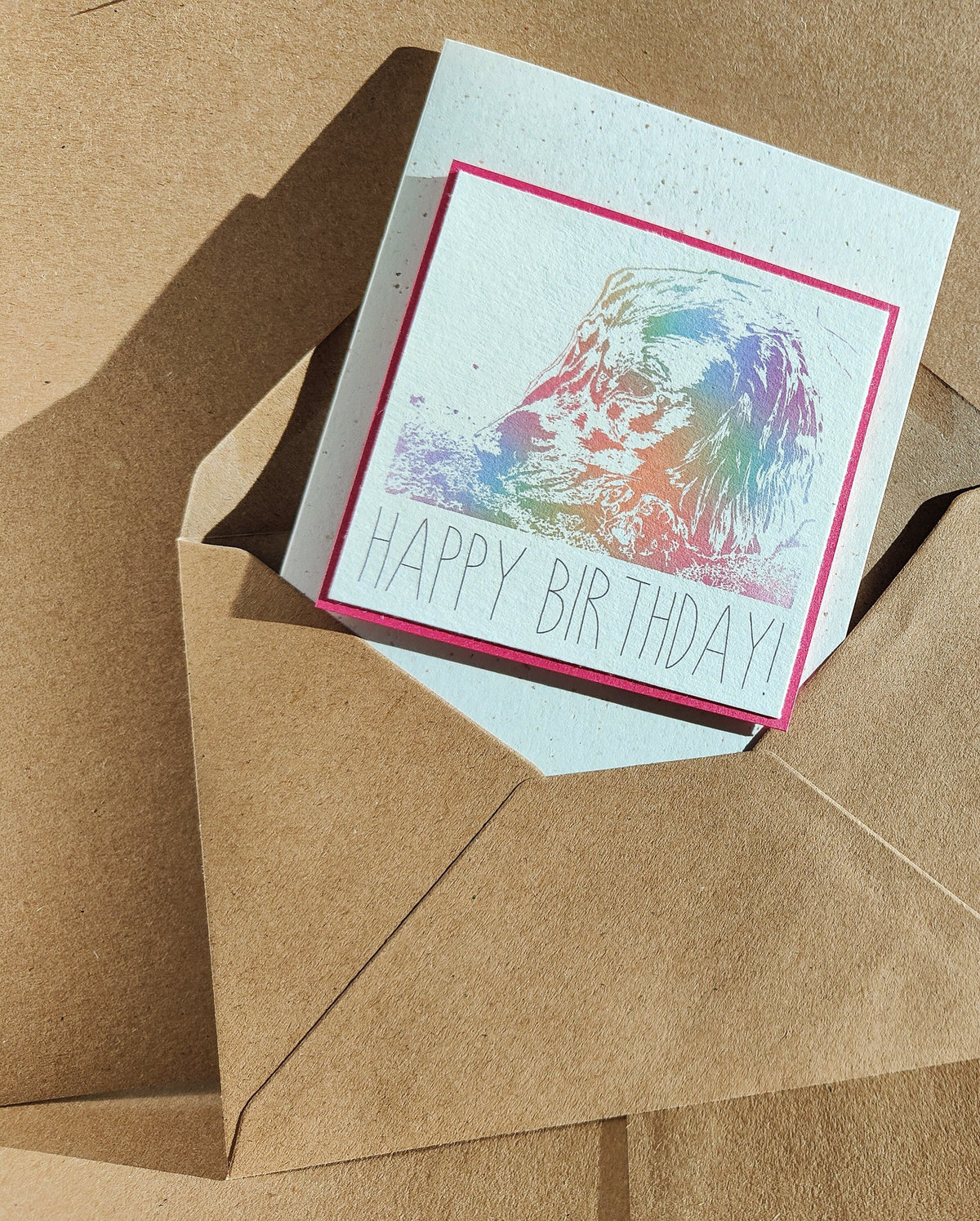 Pink Cocker Spaniel birthday card with colourful digitally illustrated spaniel design and Happy Birthday text.