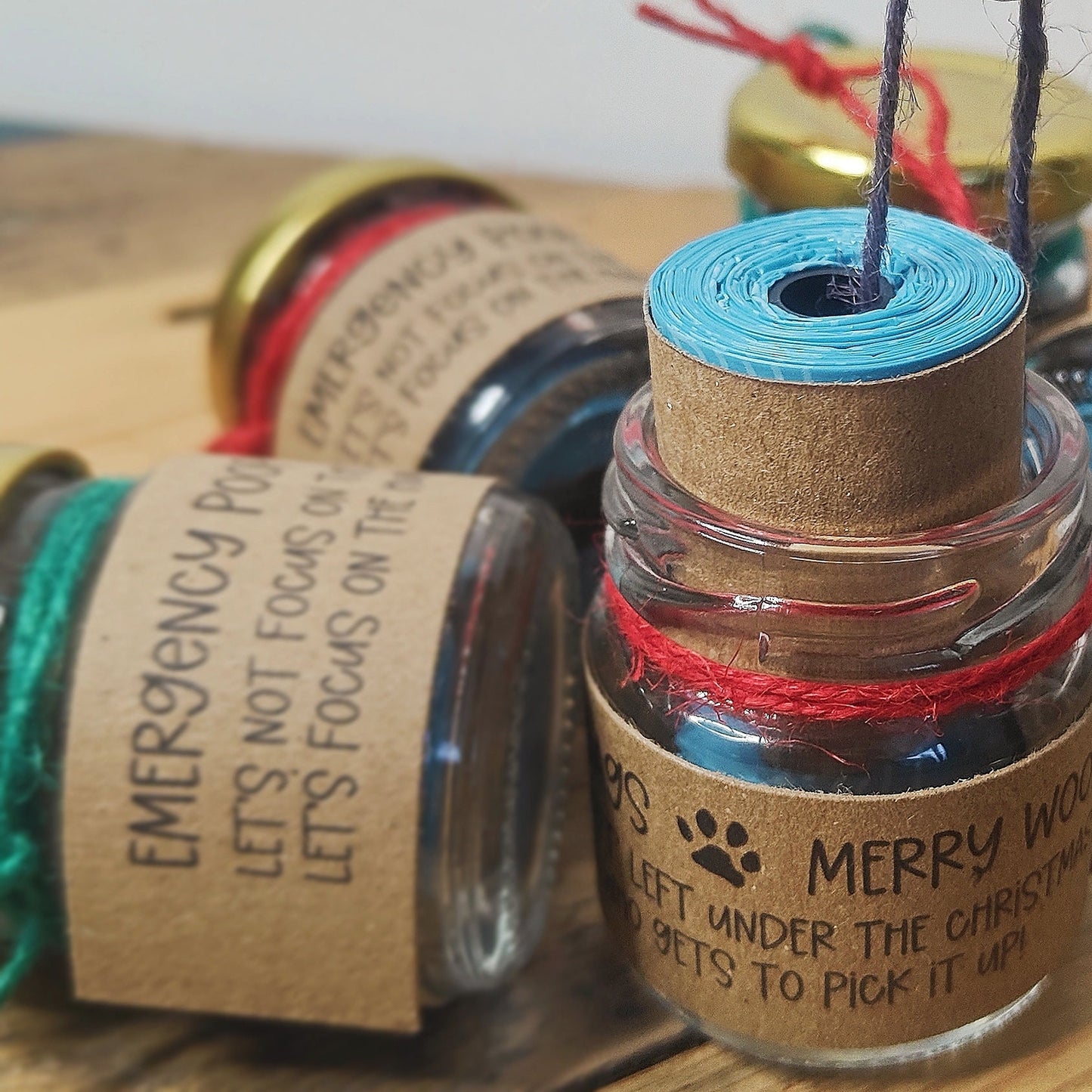 The 'Emergency Poop Bag' jar with the poop bag contents shown.