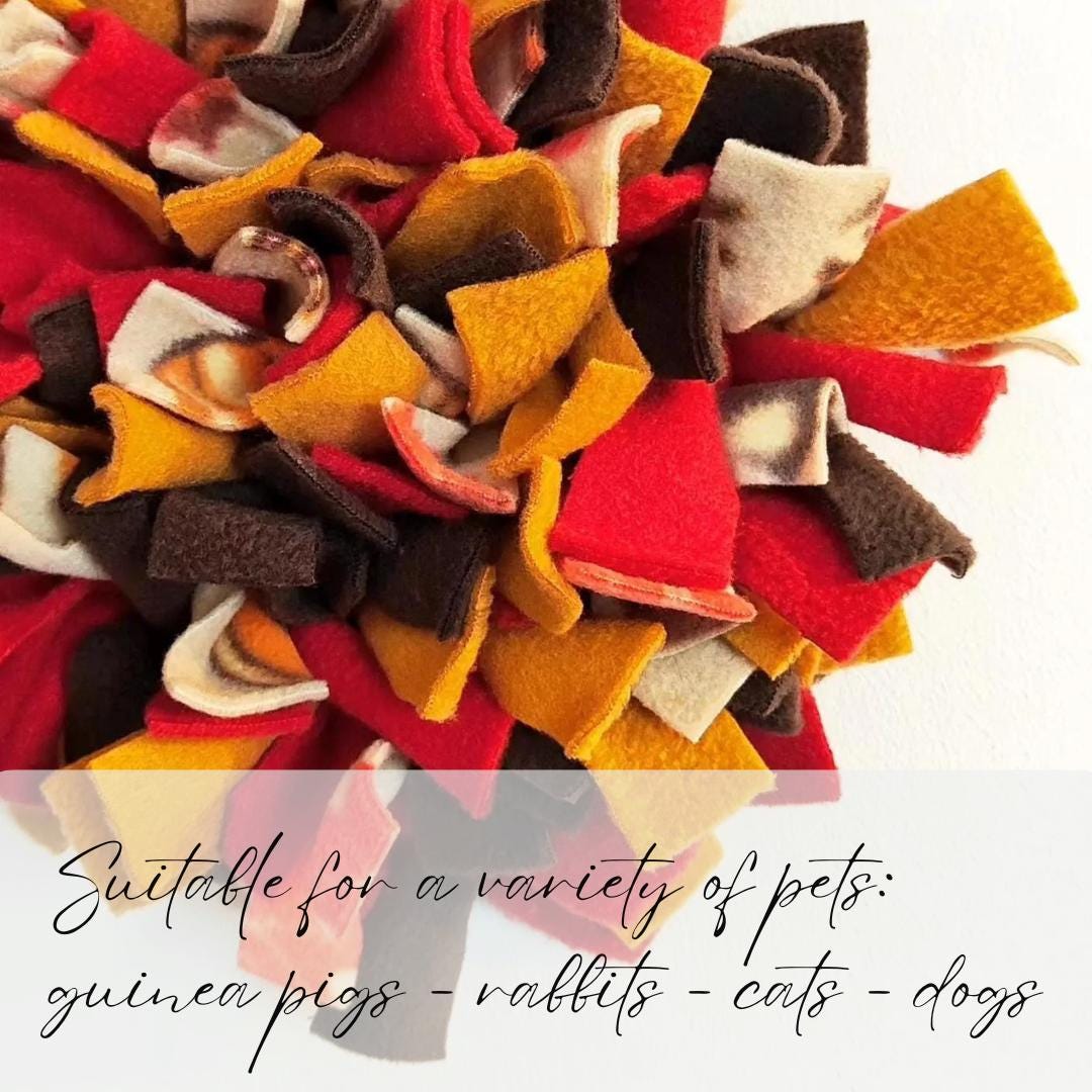 Colourful fleece enrichment mat with text indicating pet suitability 