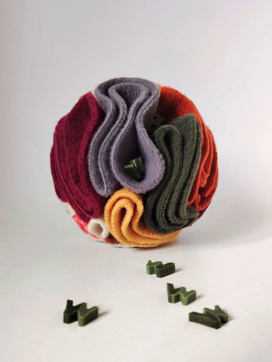 Autumn Snuffle Ball for dogs with W'ZIS treats hidden between the fleece folds.