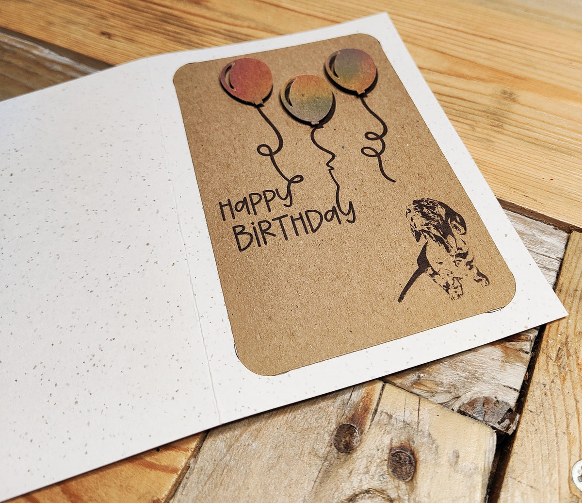 Miniature Dachshund birthday card with colourful raised balloons and Happy Birthday text shown on the full card. 